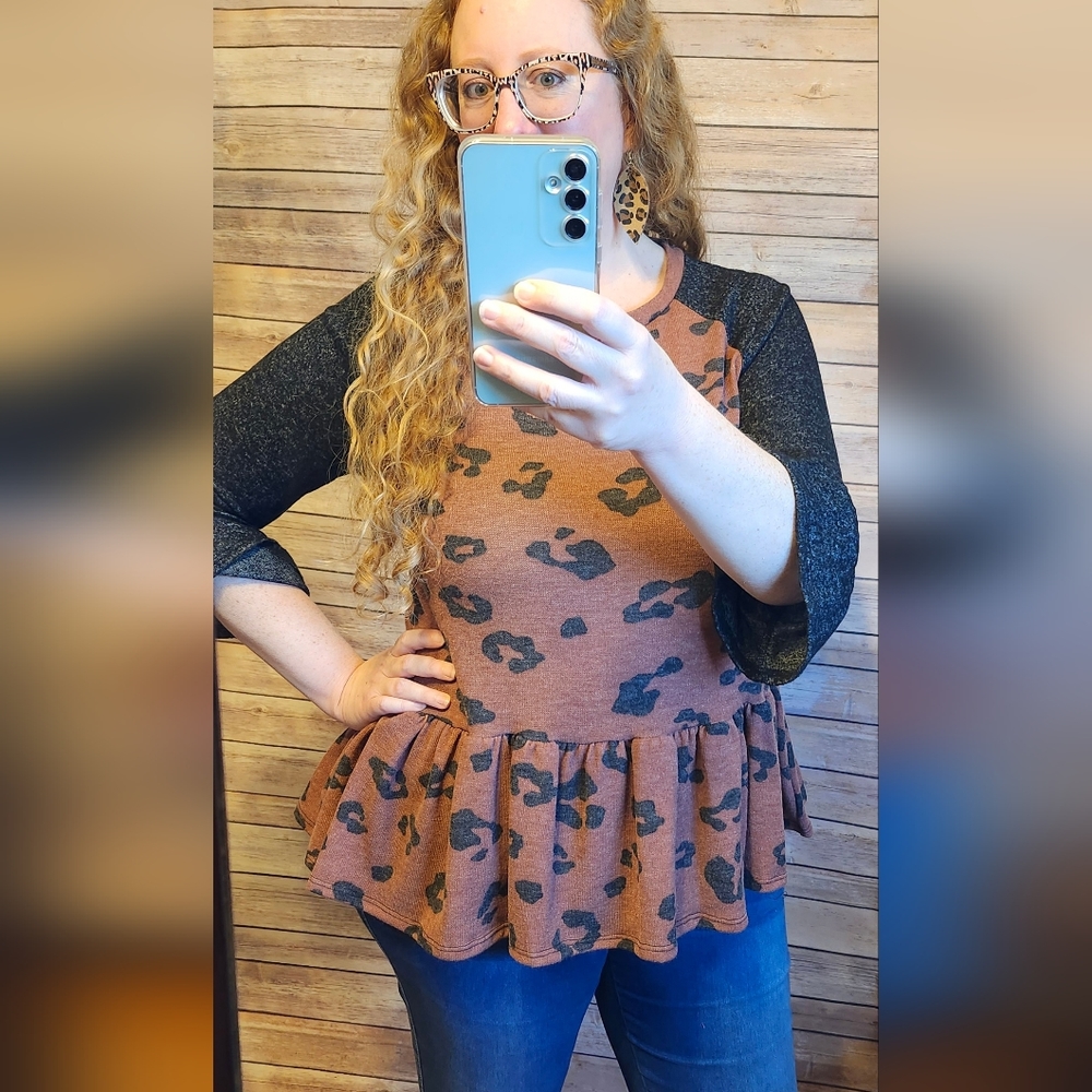 Beautiful New Rust Animal Print Peplum Top